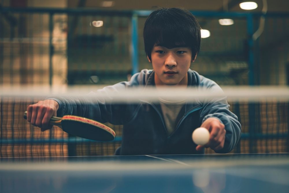 Person playing table tennis baseball softball sports.