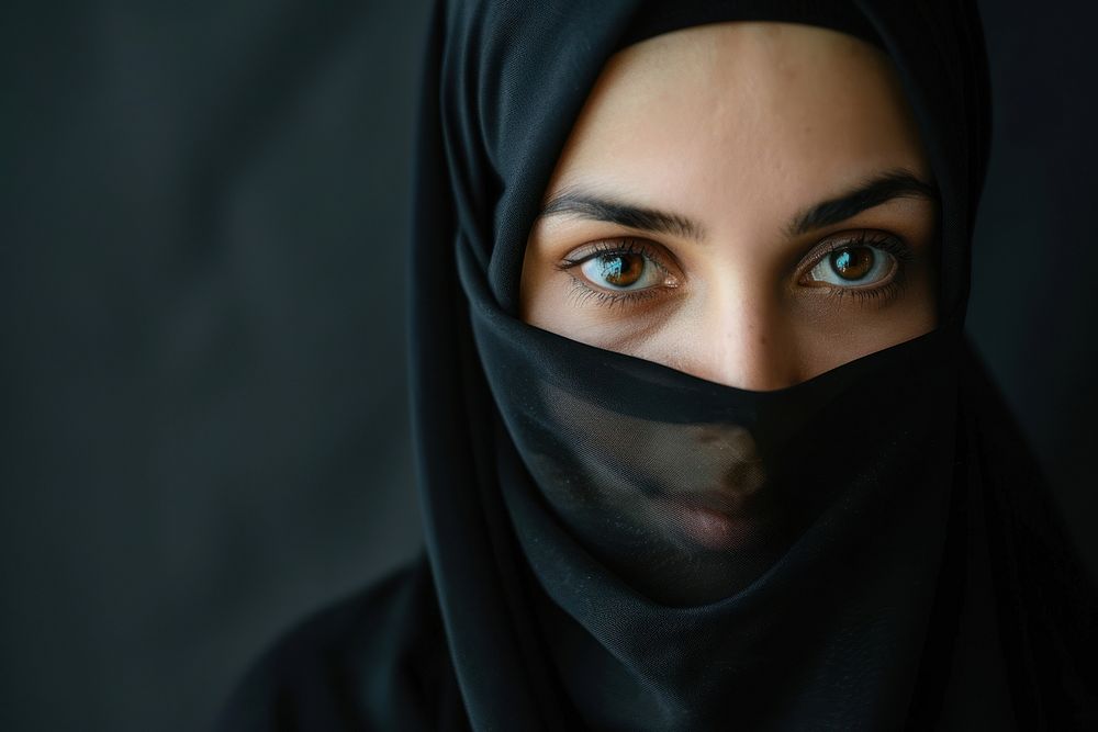 Muslim woman wearing the black hijab portrait photo photography.