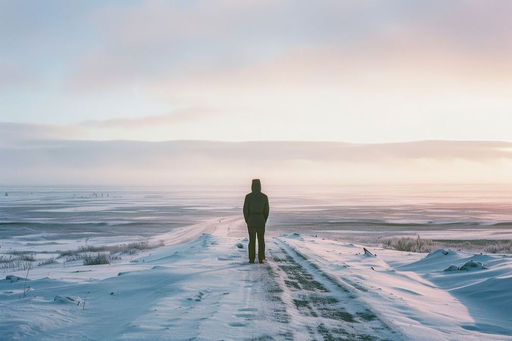 Lonely man stand in empty landscape winter photography standing outdoors.