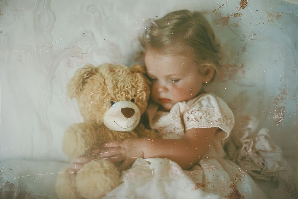 Baby girl holding teddy bear photography portrait child.