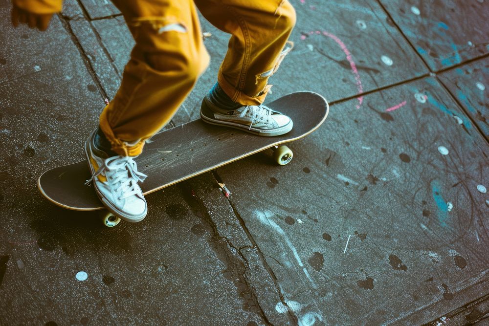 A teenager playing skateboard person human male.