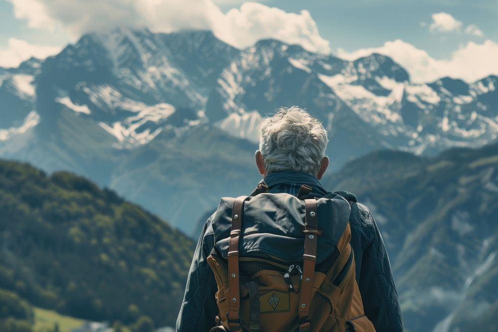 Senior traveler stand backpacking adult mountaineering.