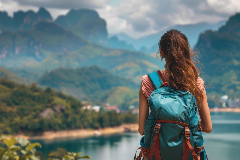 Woman traveler stand backpack photo tranquility.