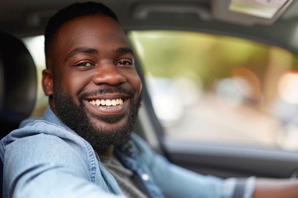Mixed race man driving a car adult smile happy.