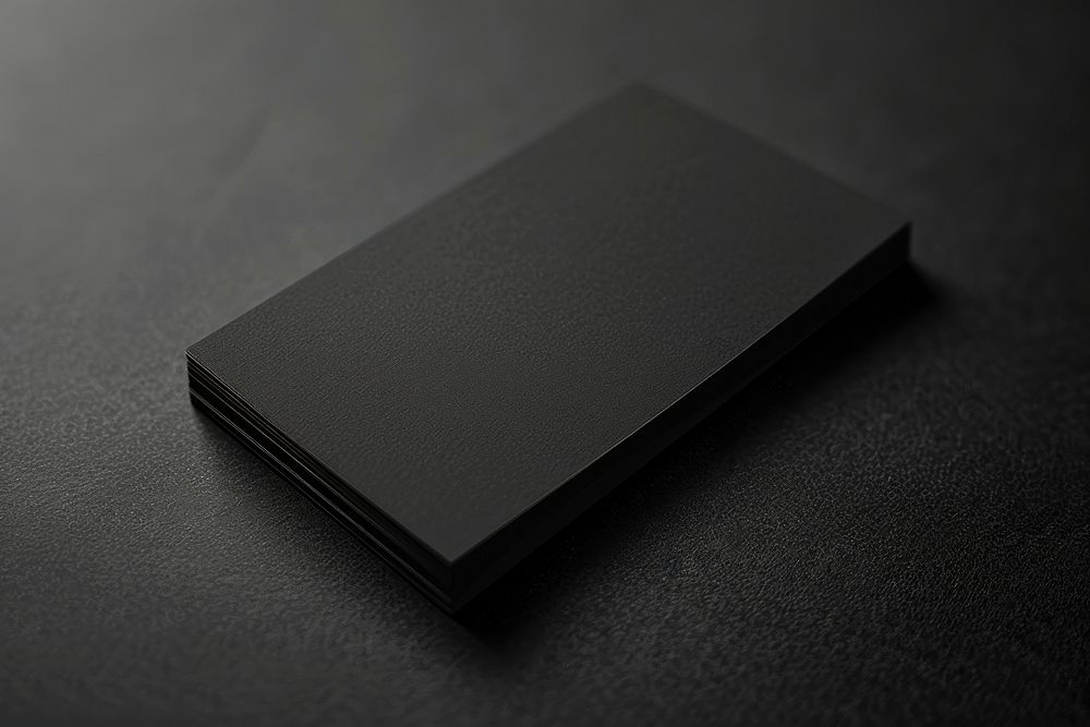 Black business card mockup electronics computer laptop.