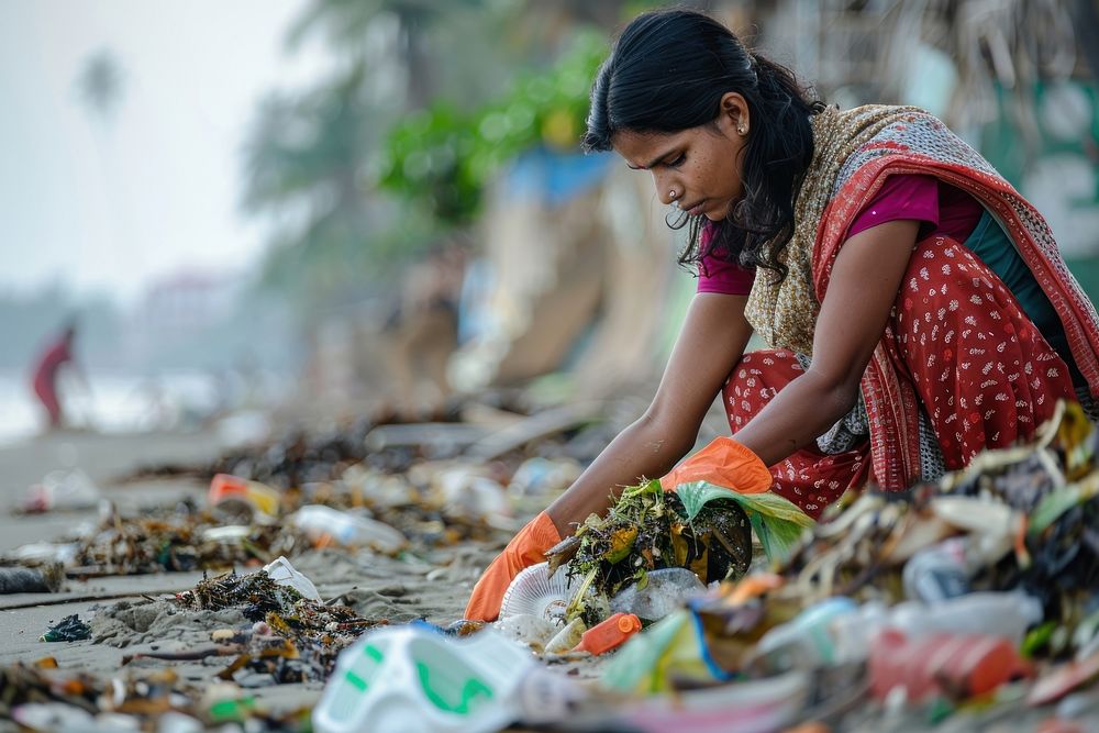 Indian woman volunteering garbage female person.