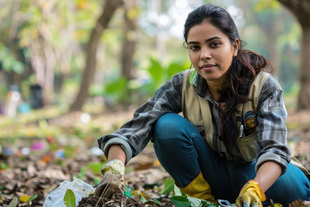 Indian woman volunteering gardening outdoors clothing.