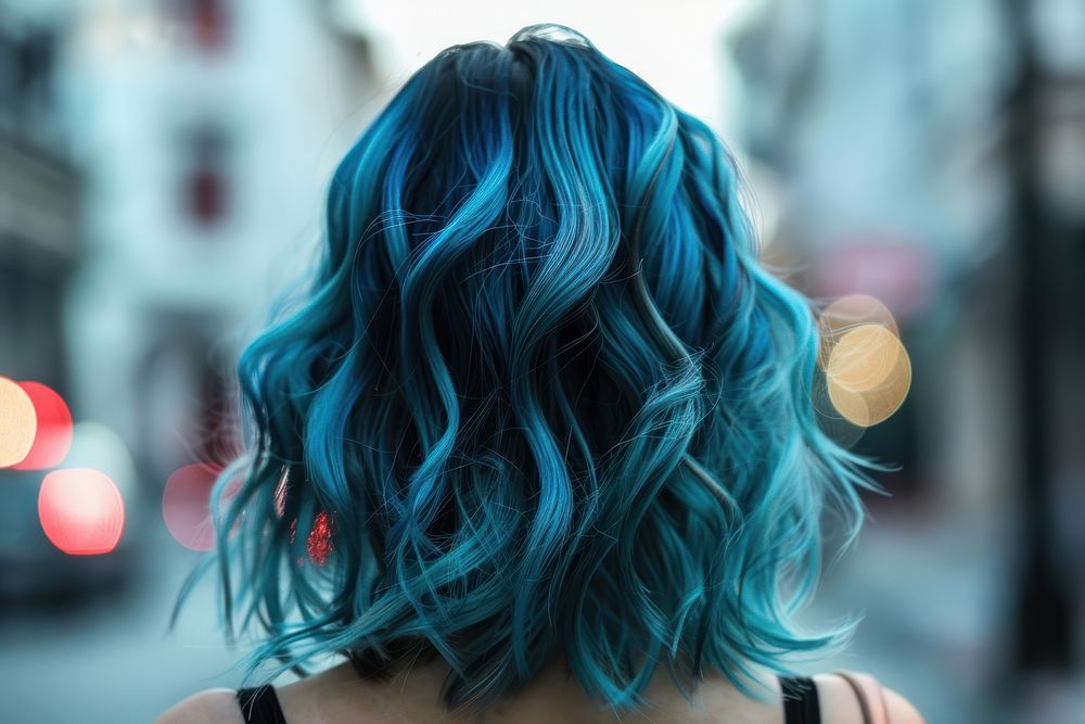 Woman blue mid-length wave hairstyles adult individuality portrait.