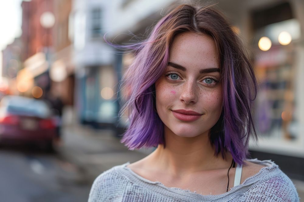 White woman purple blunt lob hairstyles portrait street adult.