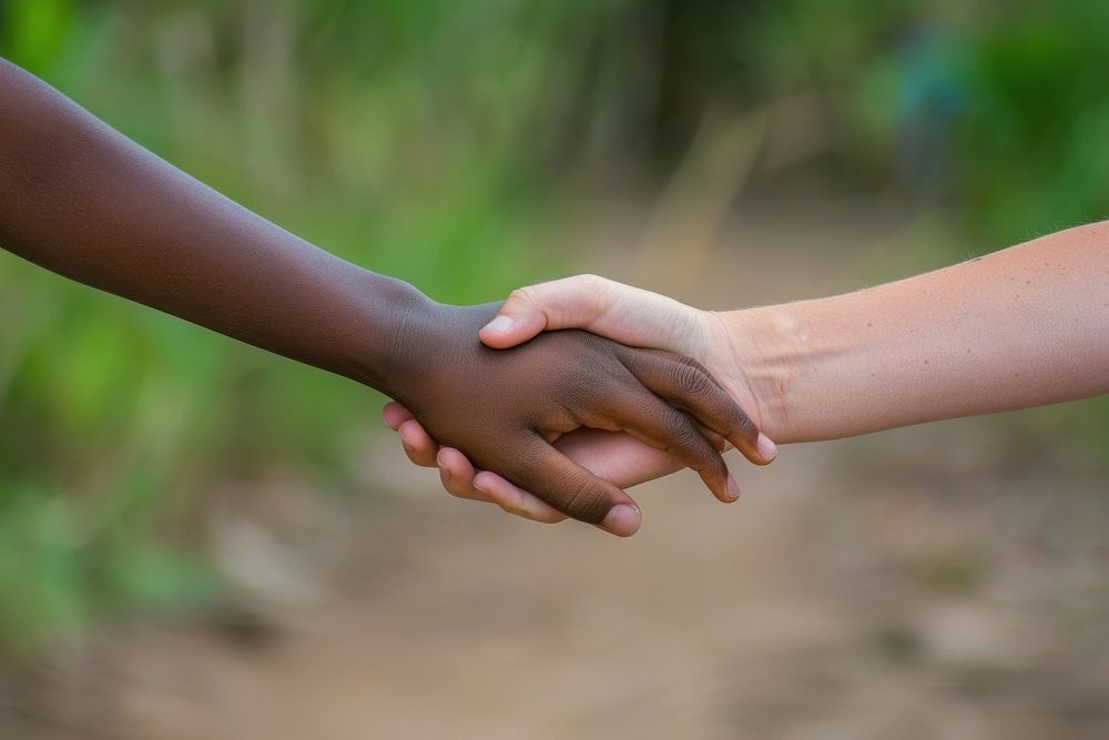Woman holding black kid hand person human holding hands.