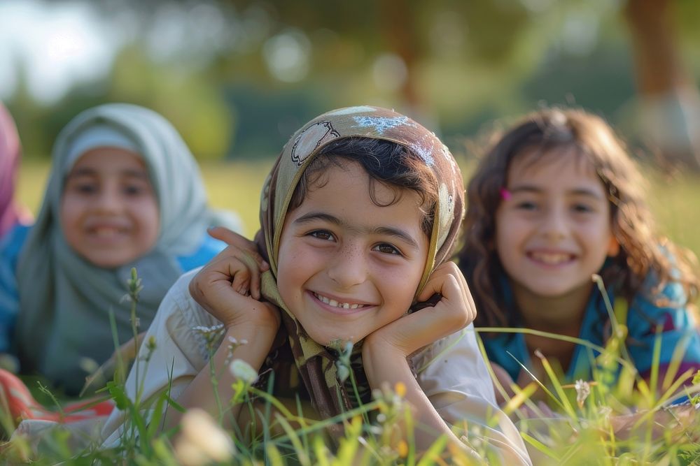 Middle eastern cheerful kids happy photo grass.