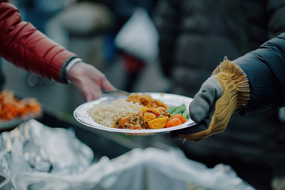People giving food glove clothing cookware.