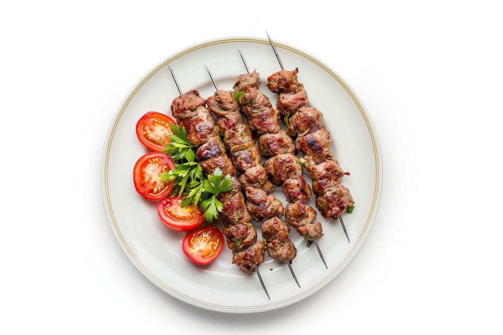 Photo of kebab dish grilling plate.