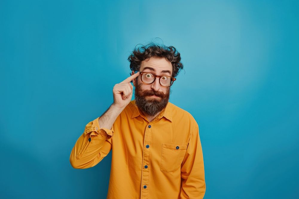 Clever man touching middle glasses Free Photo rawpixel