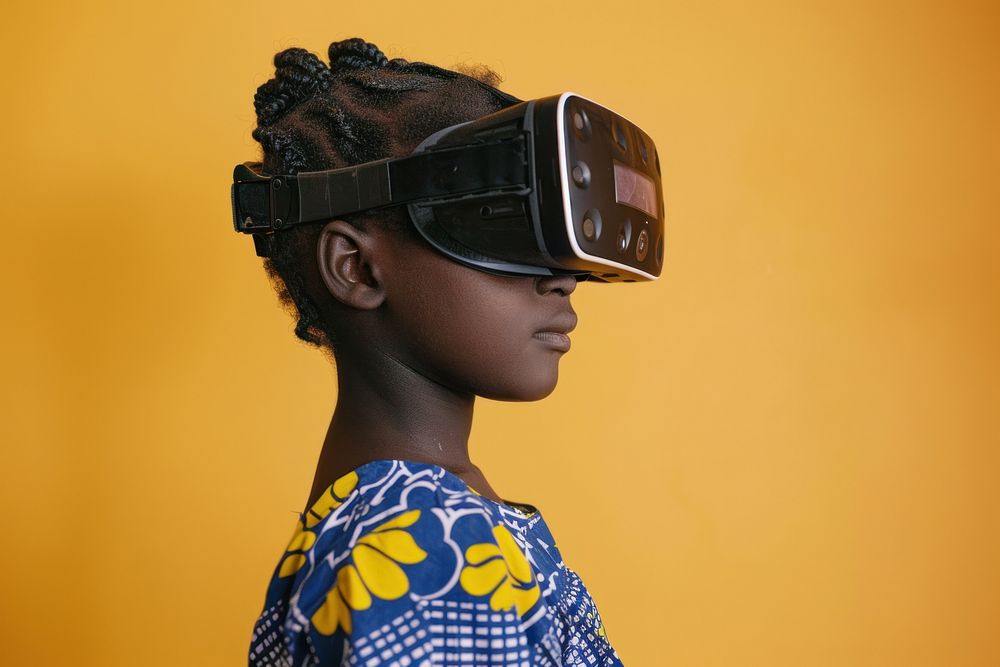 African girl wearing VR glasses photography technology portrait.
