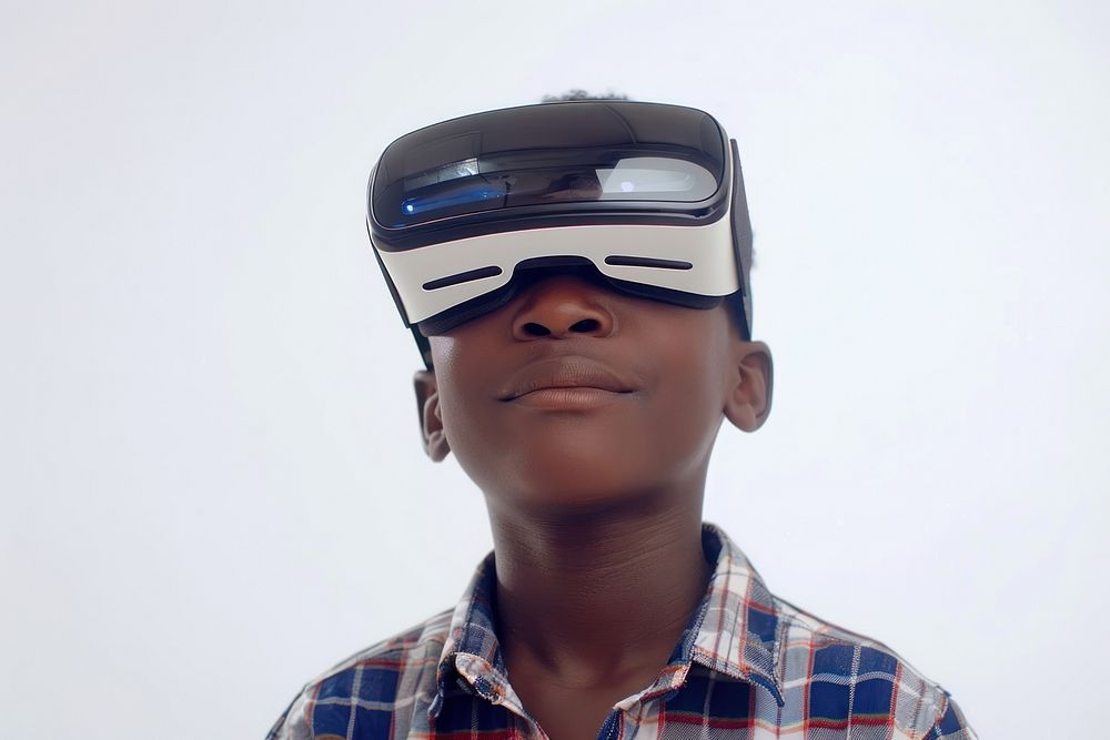 Boy wearing VR glasses portrait adult photography.