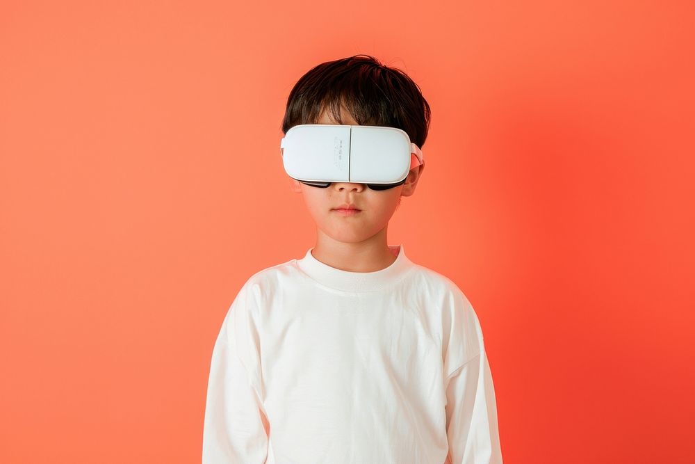 Boy wearing VR glasses portrait photography thermometer.