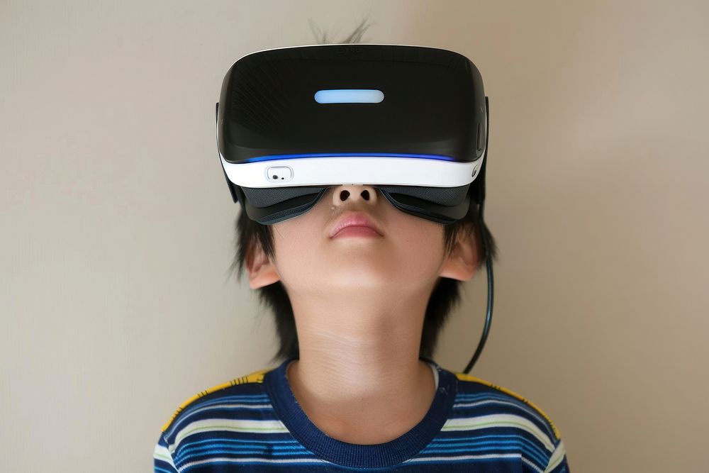 Boy wearing VR glasses portrait accessories photography.