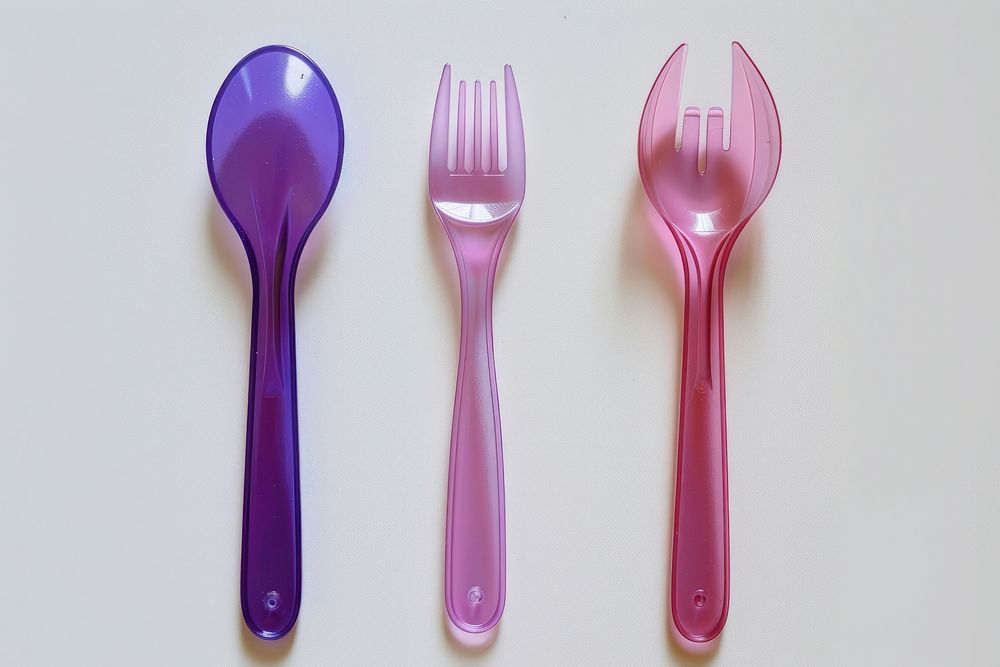 Brand new plastic utensils spoon fork silverware.