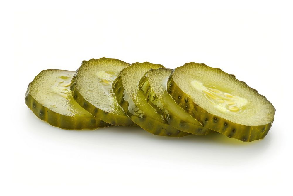 Horizontal slices of pickled gherkin fruit plant food.