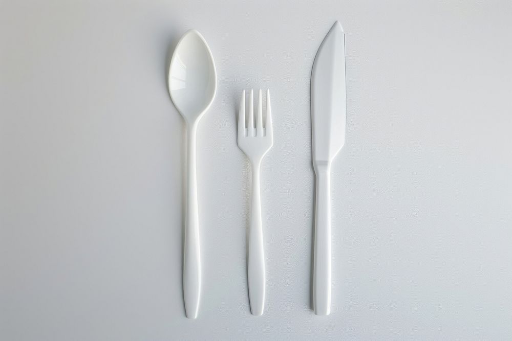 Plastic fork and knife spoon white silverware.