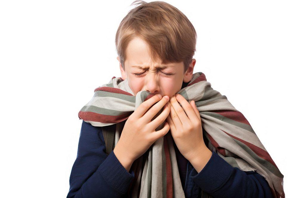 Boy coughing into handkerchief white background frustration portrait.