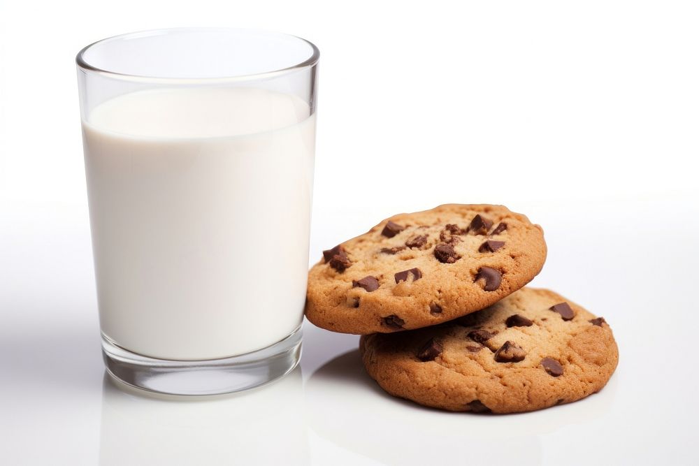 Chocolate chip cookies in milk dairy food white background.
