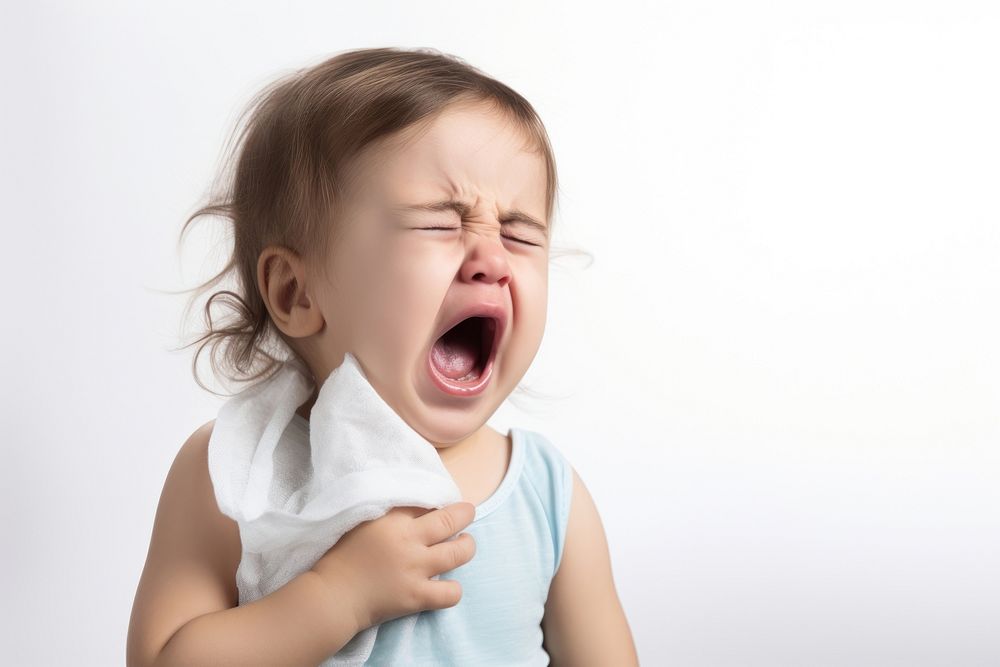 Sick baby coughing yawning white background frustration.