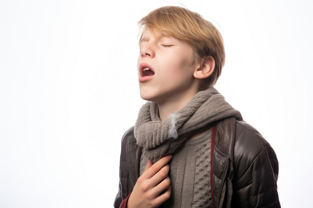 Sick boy coughing hard yawning child white background.