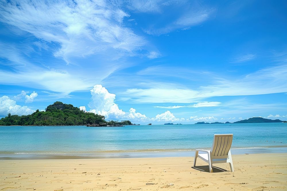 Beautiful tropical beach chair land sky.