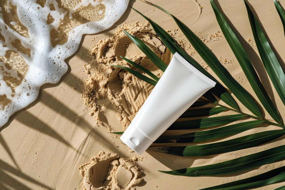 Sunscreen tube mockup beach cosmetics outdoors.