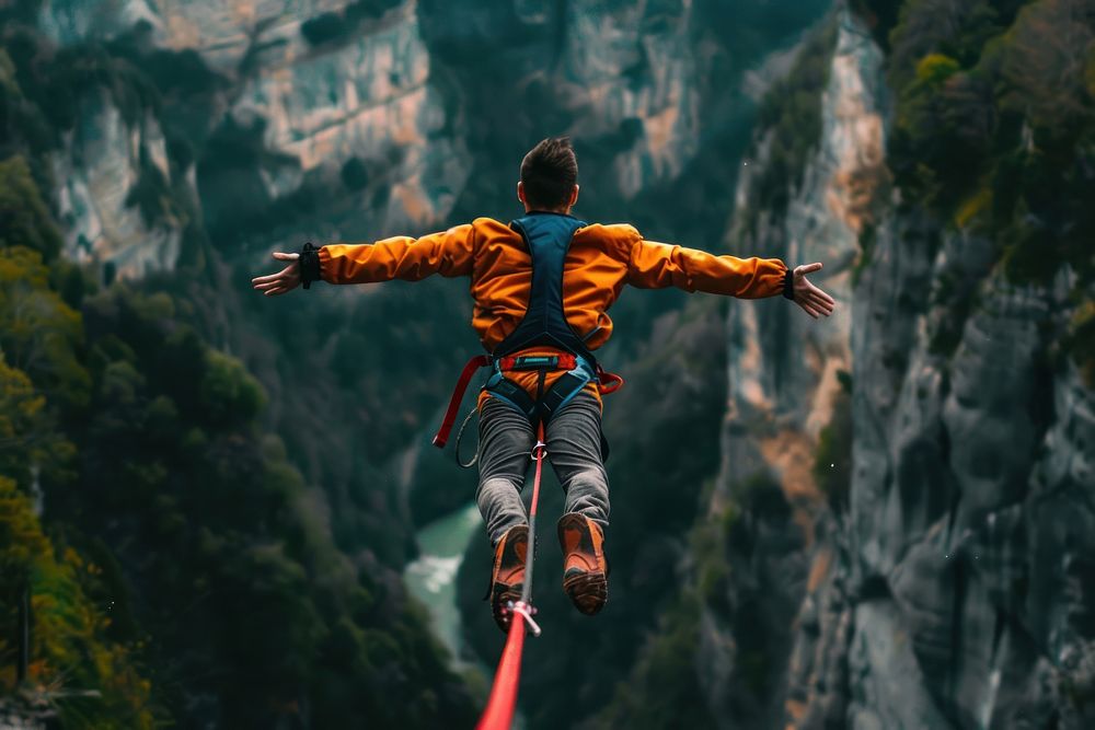 Man bungee jumping recreation adventure outdoors.