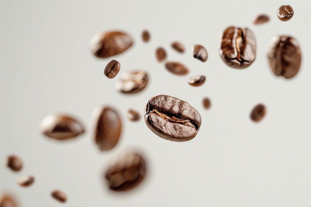 A coffee beans falling freshness beverage brown.