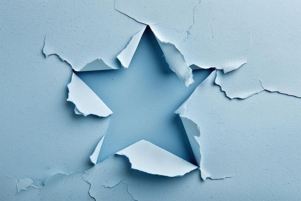 Torn paper in star shaped backgrounds damaged cracked.