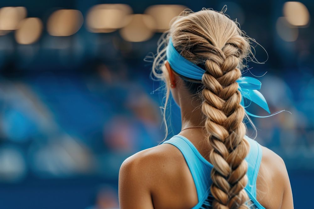 Tennis player looking sports braid.