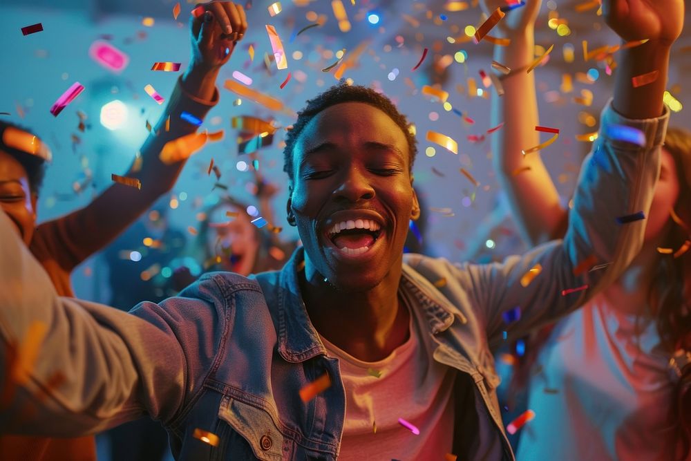 Cheerful black man celebrating cheerful party adult.