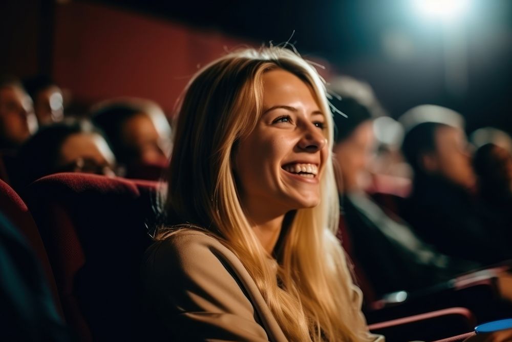Young woman enjoying while watching movie smiling adult happiness.