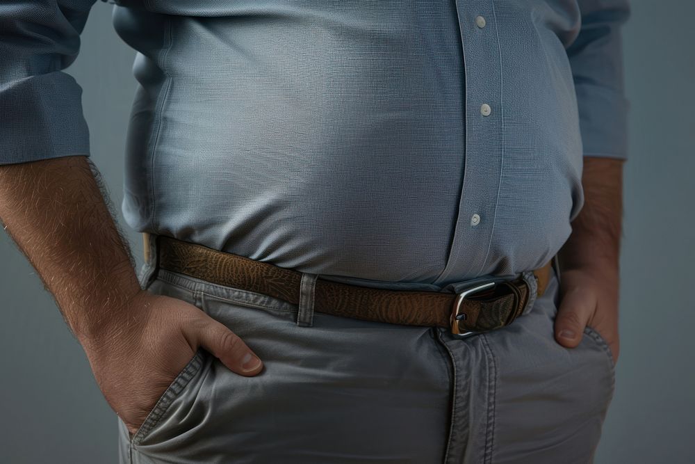 Tight shirt showing full belly adult belt man.