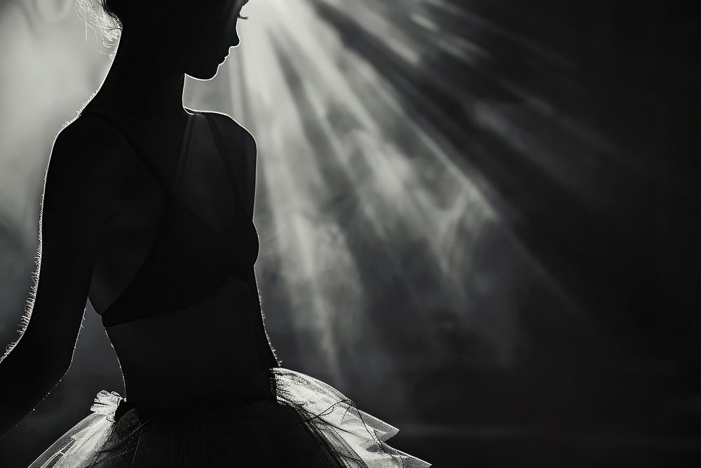 Ballerina on stage light recreation silhouette.