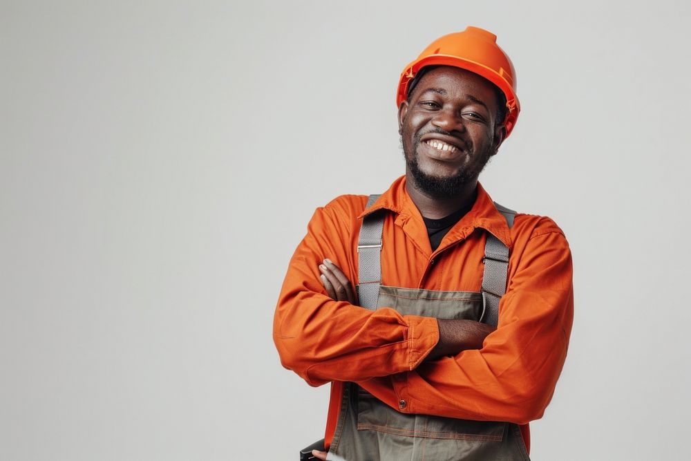 Joyful male african american builder hardhat helmet white background.