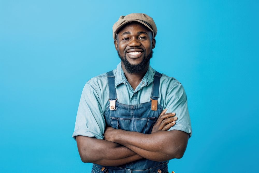 Joyful male african american builder smile adult blue.