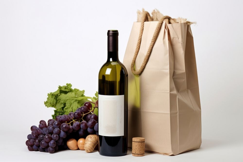 Paper bag with fresh vegetables bottle handbag wine.