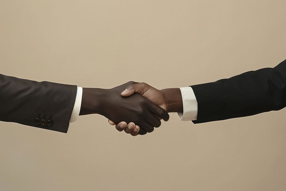 Business man hand shaking human handshake clothing.