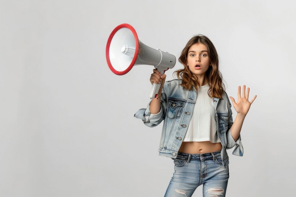 Woman holding megaphone shouting hand white background.