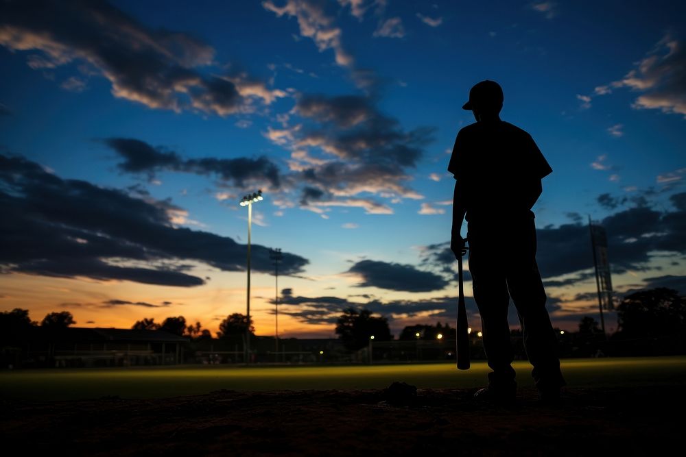 Baseball silhouette photography backlighting weaponry outdoors.
