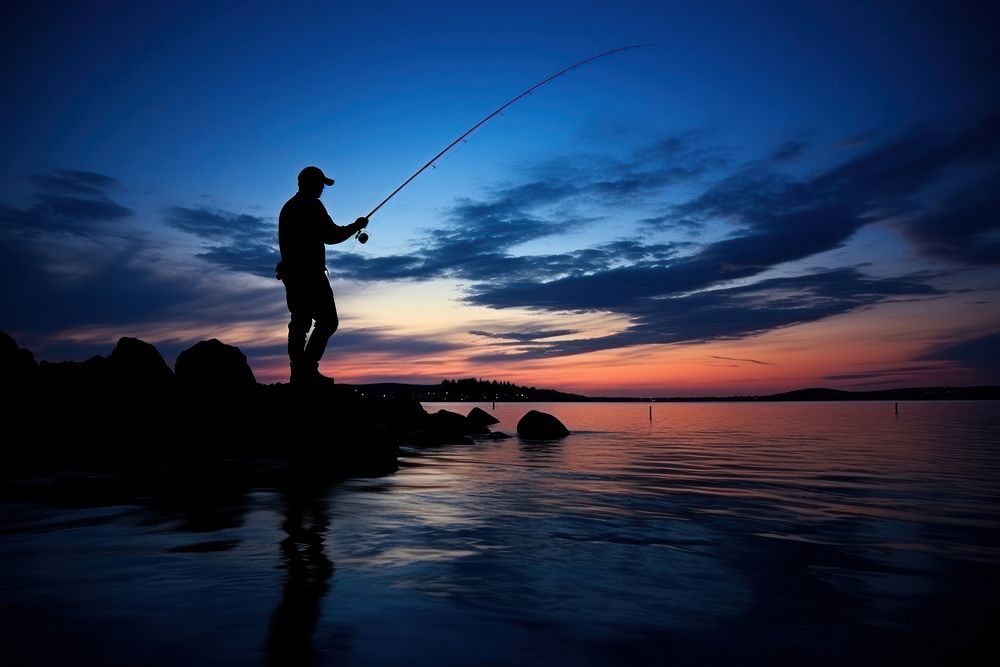 Fishing silhouette photography backlighting recreation outdoors.