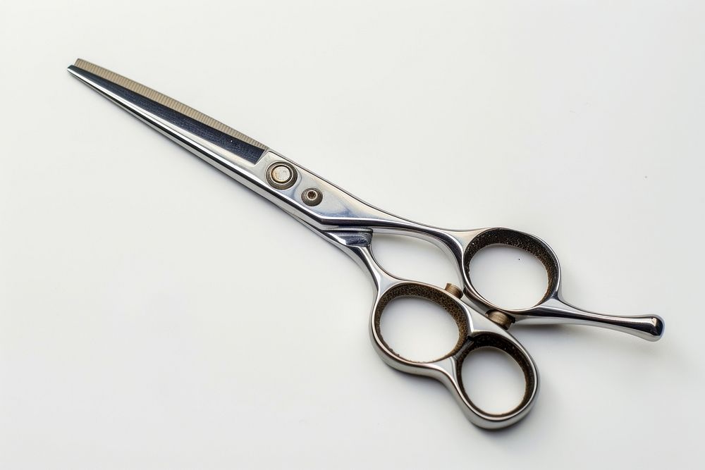 Haircutting Scissors scissors white background equipment.