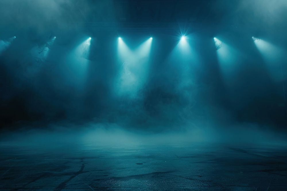 Illuminated stage with spotlights and smoke underwater outdoors lighting.