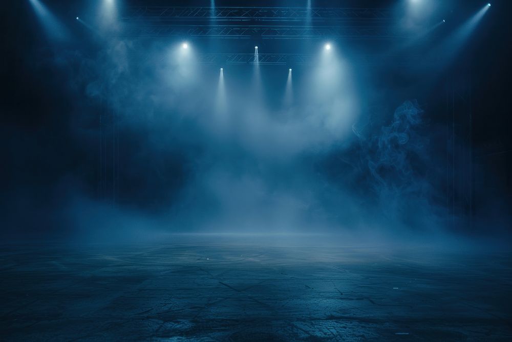Illuminated stage with spotlights and smoke lighting outdoors nature.