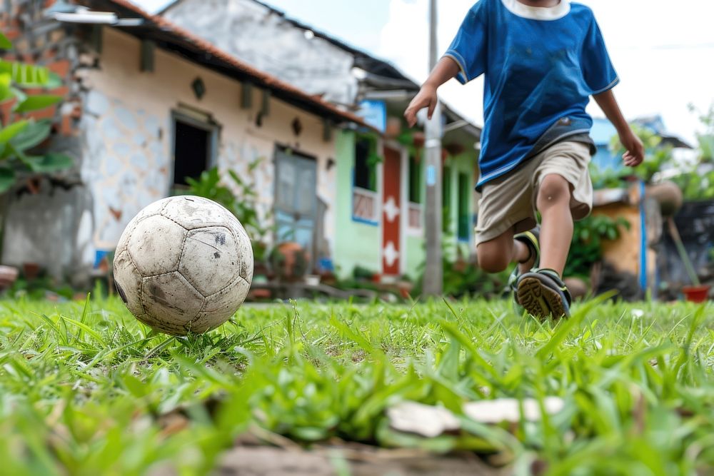Kid playing sport sports football clothing.
